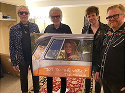 Members of the band Three Dog Night with our Artwork